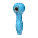 The Astral Gemstone Spoon Pipe displayed on a reflective surface, highlighting its polished finish and artistic gemstone accents, ideal for gifting or personal use.