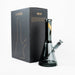 Elevate your collection with the Marley Natural Smoked Glass Water Pipe from Vivant. Enjoy cool and smooth smoke with a stylish beaker-style design, eight-slit percolator stem, and ice disc.